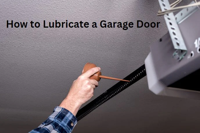 A person lubricating a garage door chain with an oil can.