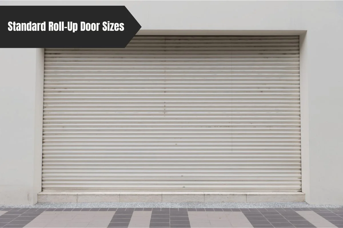 Closed roll-up door on a building with a 'Standard Roll-Up Door Sizes' banner.